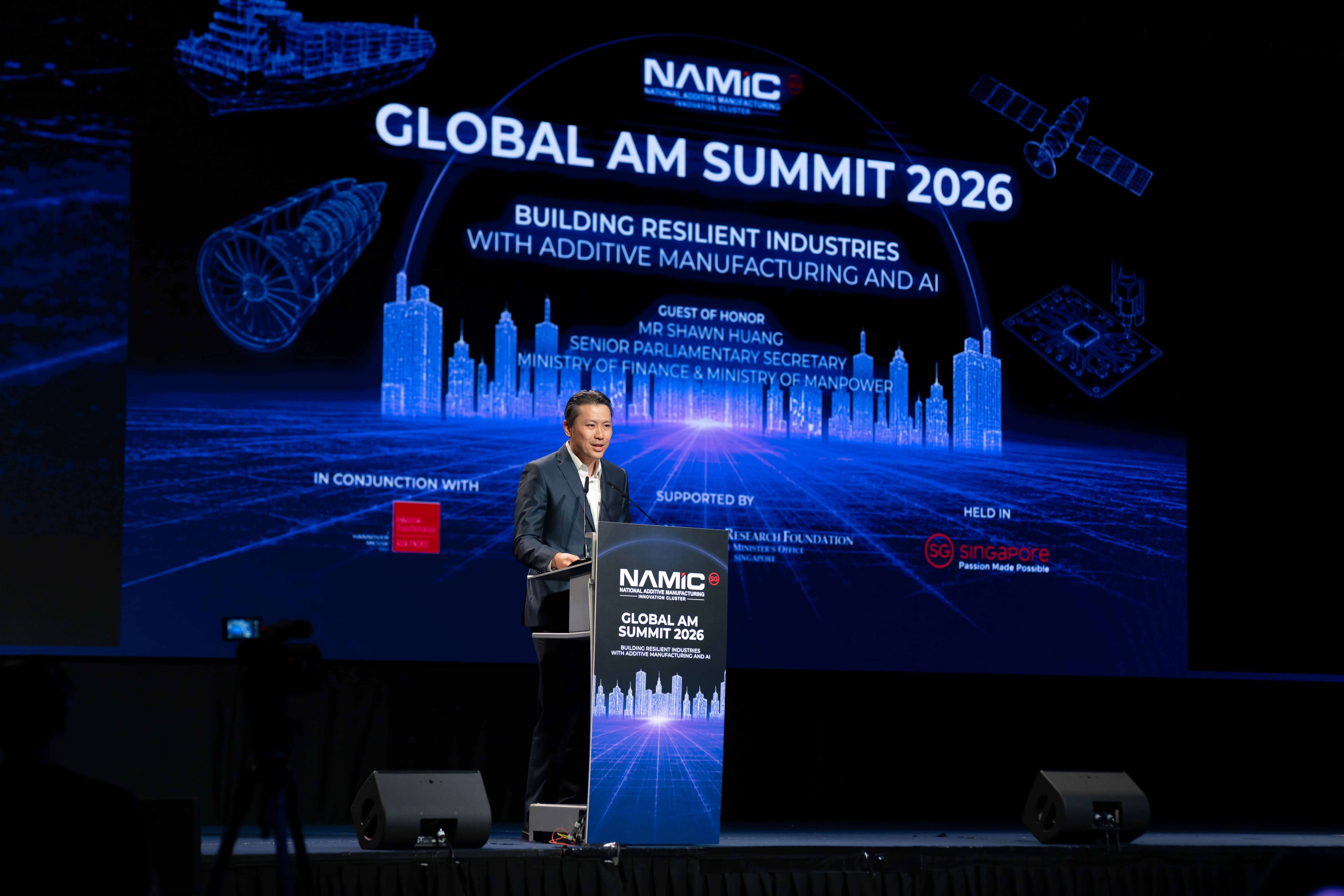 Mr Shawn Huang, Senior Parliamentary Secretary, Ministry of Finance and Ministry of Manpower, delivering the opening address as Guest-of-Honour at GAMS 2026. (1).jpg