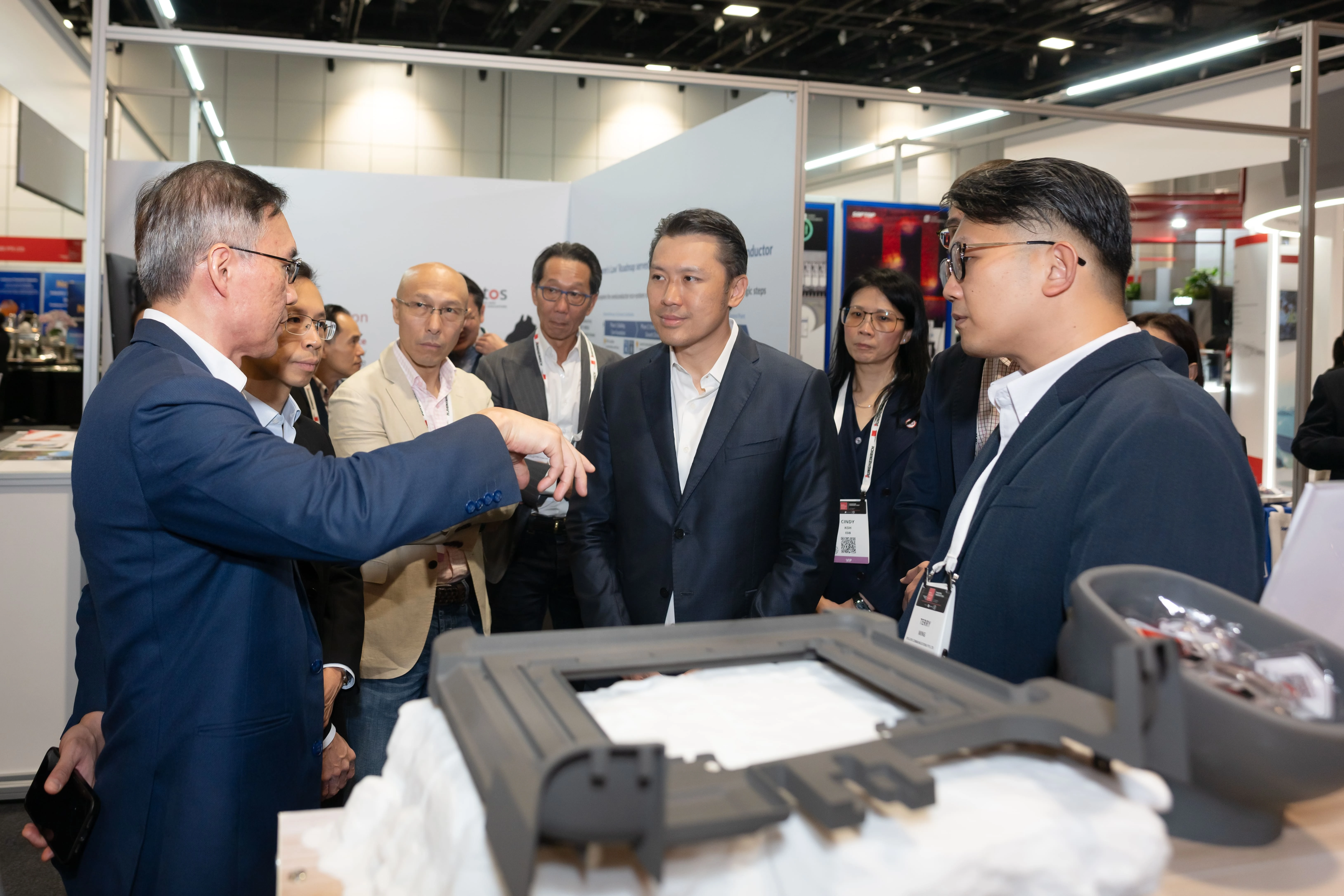Dr Ho Chaw Sing, Executive Director, A_STAR SERC and CEO, NAMIC shares more on additive manufacturing technologies during the ITAP 2026 exhibition tour with Guest-of-Honour Mr Shawn Huang, Senior Parliamentary  (1).jpg